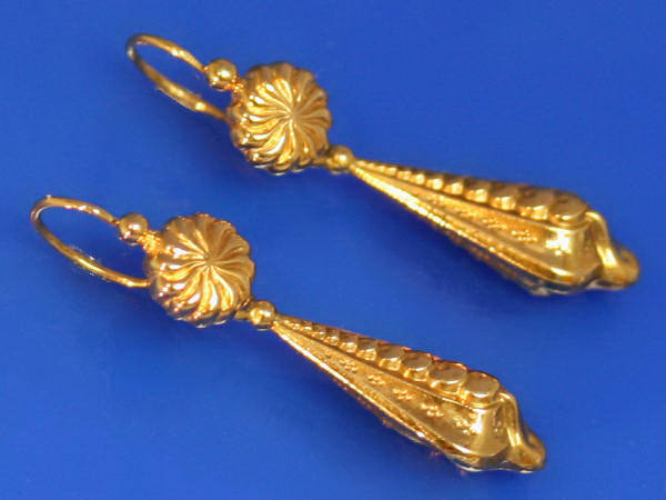 Richly elaborated pendent vintage earrings